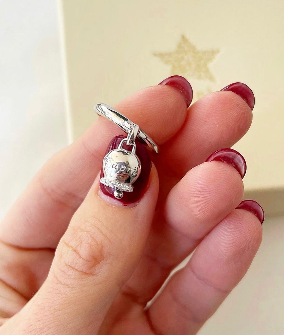 Anello campanella con bordo in zirconi
