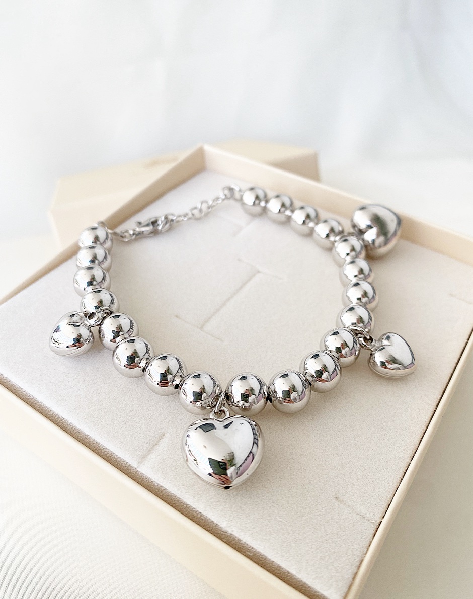 Bracciale sfere 4 cuori bombati