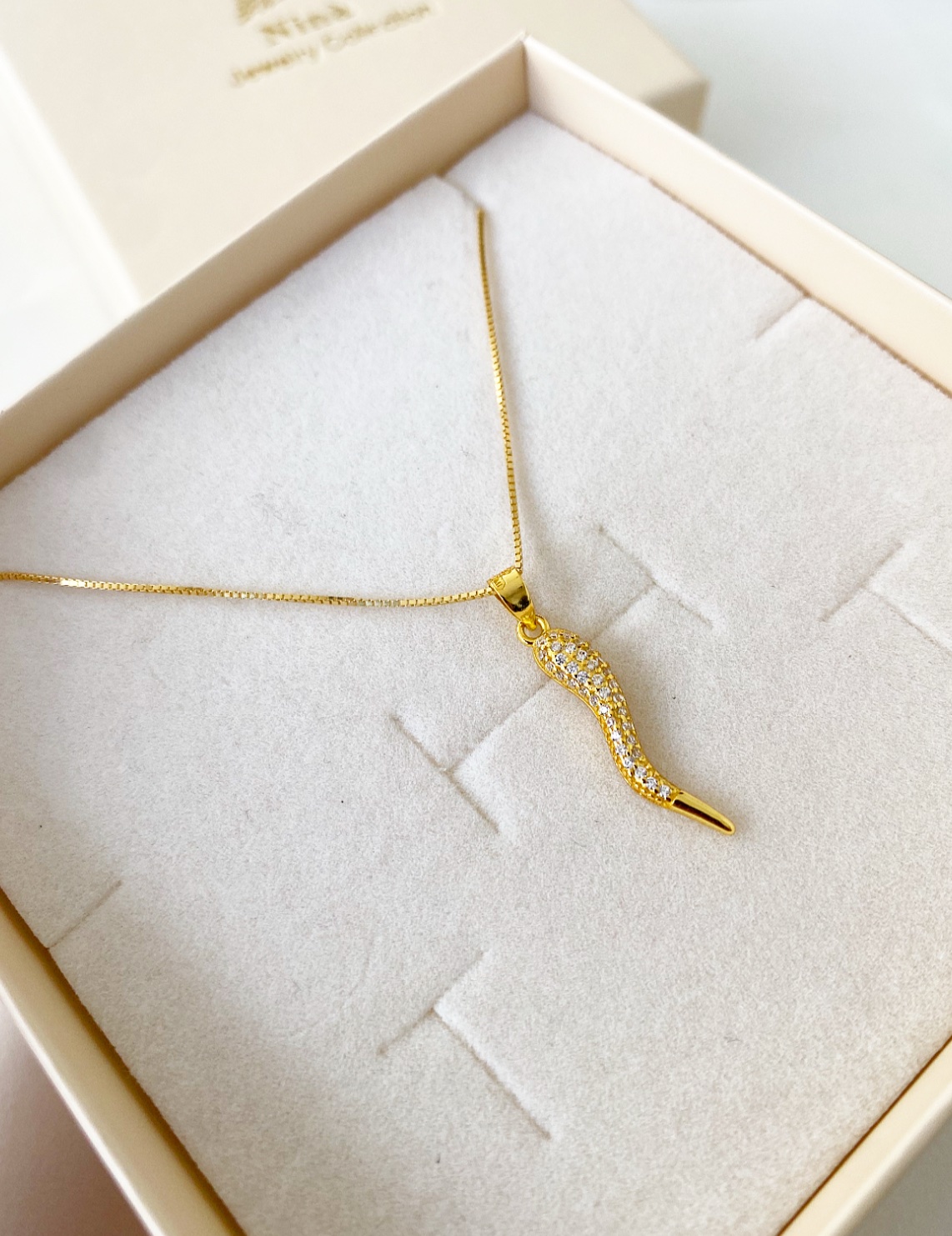 Collana corno in zirconi